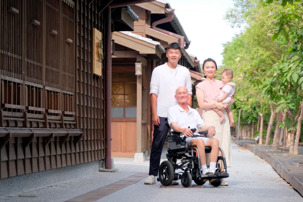 a-elder-in-a-power-wheelchair-going-on-a-trip-with-his-family