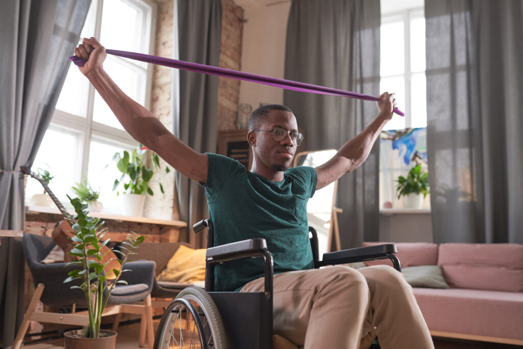 A-man-in-wheelchair-stretching-his-upper-body